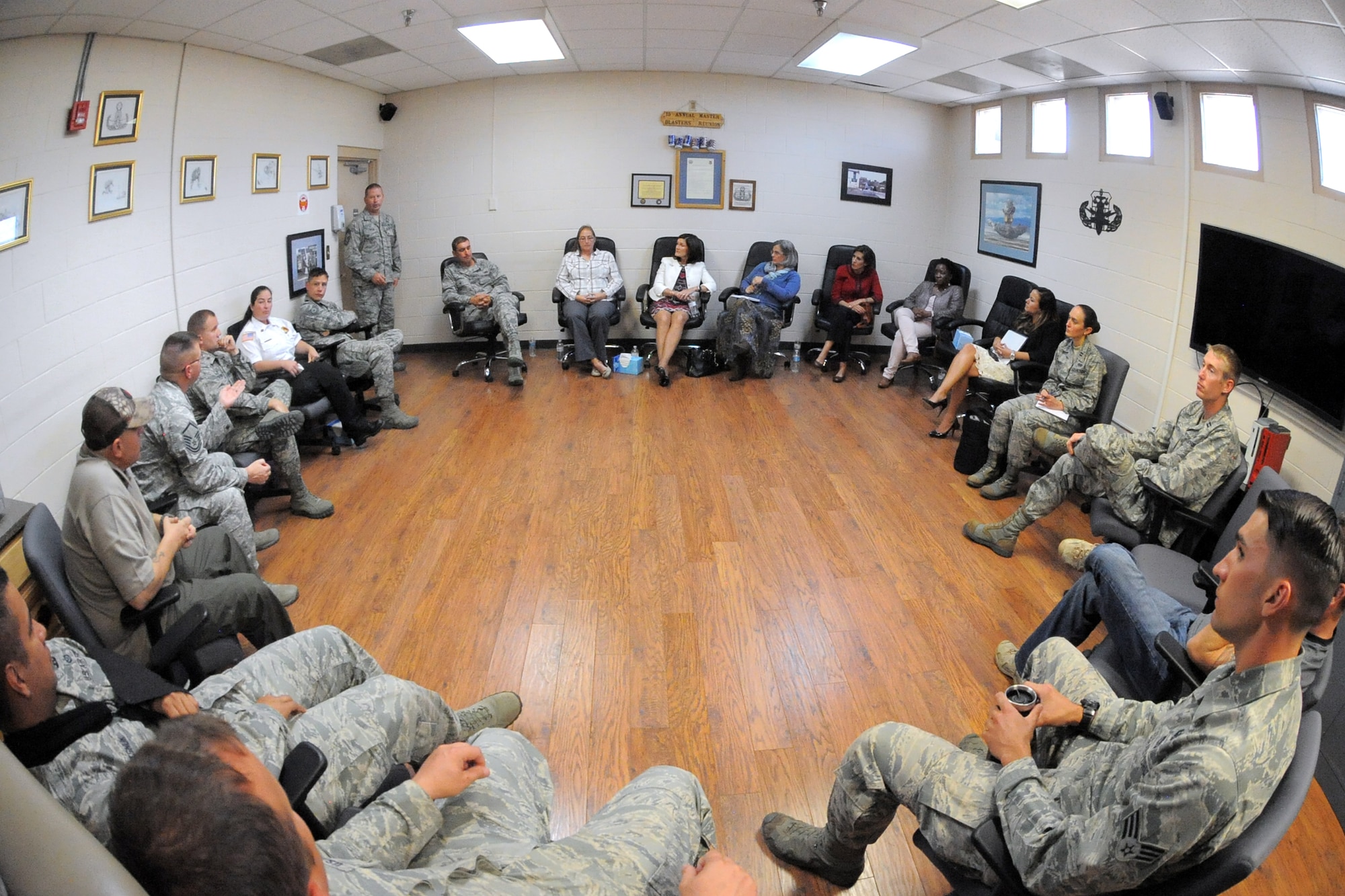 Betty Welsh, wife of Air Force Chief of Staff Gen. Mark A. Welsh III, talks with Explosive Ordnance Disposal Airmen, base leaders, and key spouses during a meeting at Hill Air Force Base, Utah, Thursday, Oct. 15, 2015. Welsh visited this group to discuss Wounded Warrior issues, and  to provide EOD personnel the opportunity to discuss quality of life programs at Hill and gain an understanding of Air Force family successes and challenges. (U.S. Air Force photo by Todd Cromar/Released)