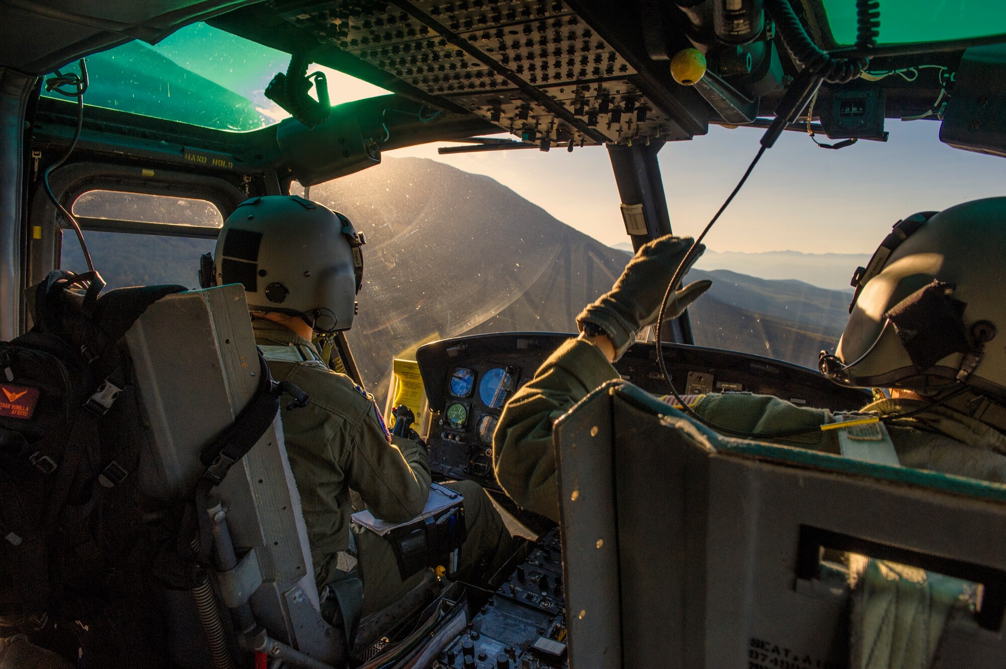 Capt. Jonathan Bonilla and Capt. Daniel Trapani, 459th Airlift Squadron pilots, operate a UH-1N Huey above the Combined Arms Training Center Camp Fuji, Japan, Oct. 13, 2015. Airmen from the 459 AS regularly practice their airlift capabilities in order to respond to regional contingencies. (U.S. Air Force photo by Airman 1st Class Delano Scott/Released)