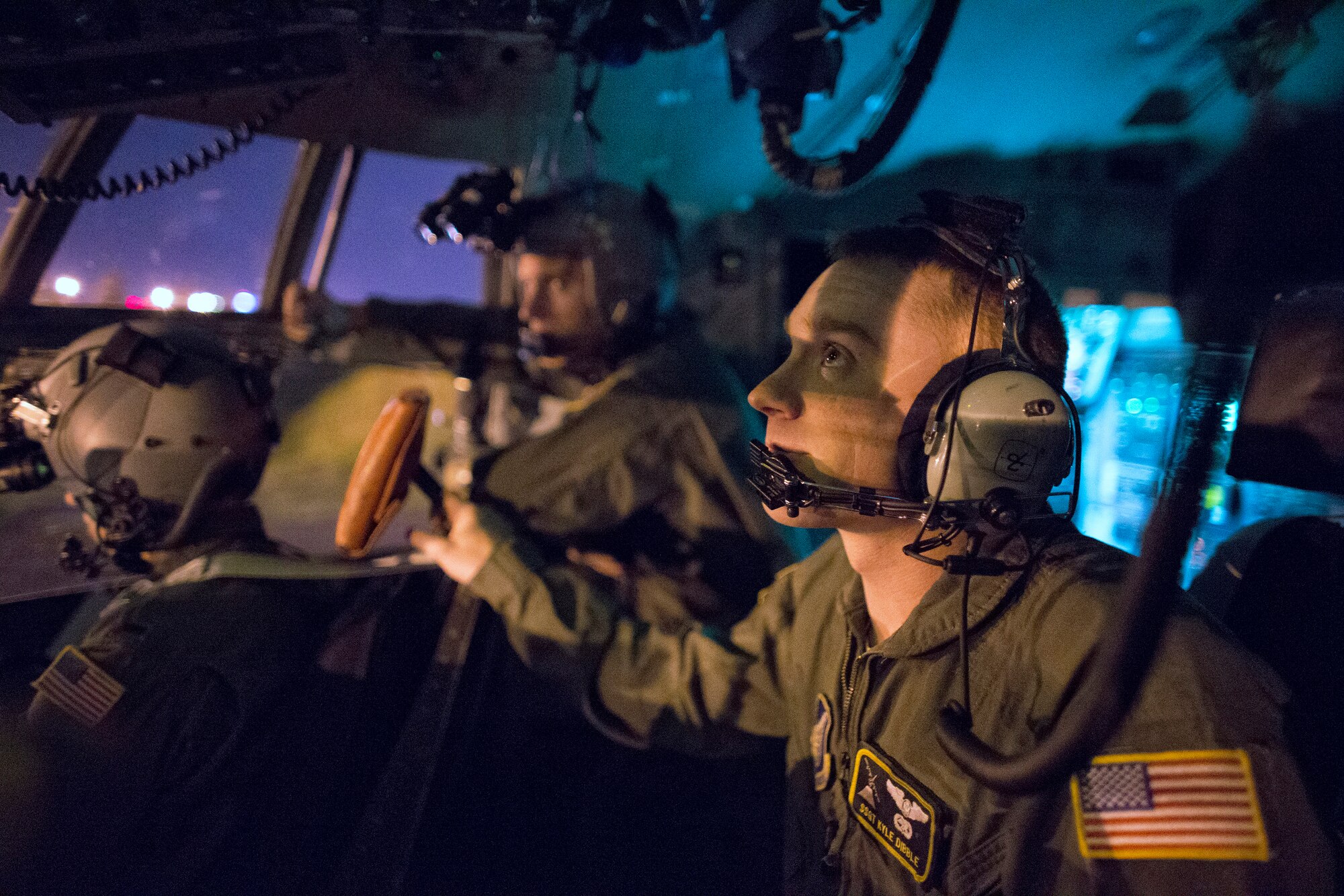 Staff Sgt. Kyle Dibble, 36th Airlift Squadron flight engineer, performs pre-flight inspection at Yokota Air Base, Japan, Oct. 14, 2015, during a training mission. Yokota aircrews regularly conduct night flying operations to ensure they’re prepared to respond to a variety of contingencies throughout the Indo-Asia Pacific region. (U.S. Air Force photo by Osakabe Yasuo/Released)