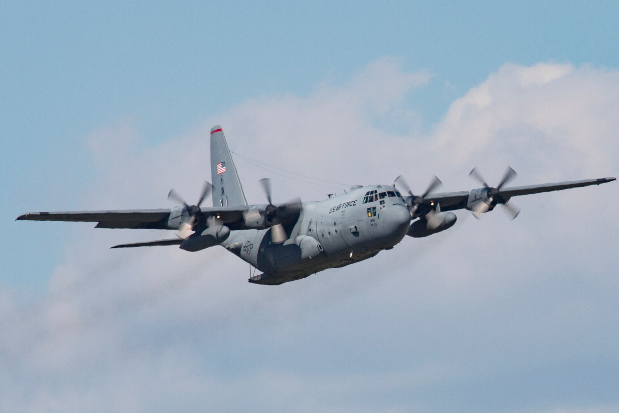 A C-130 Hercules from the 36th Airlift Squadron is ready to perform a low-cost, low-altitude airdrop at Yokota Air Base, Japan, Oct. 8, 2015. The LCLA airdrops are a special container delivery system, designed to be used and discarded rather than turned in and reused. (U.S. Air Force photo by Osakabe Yasuo/Released)