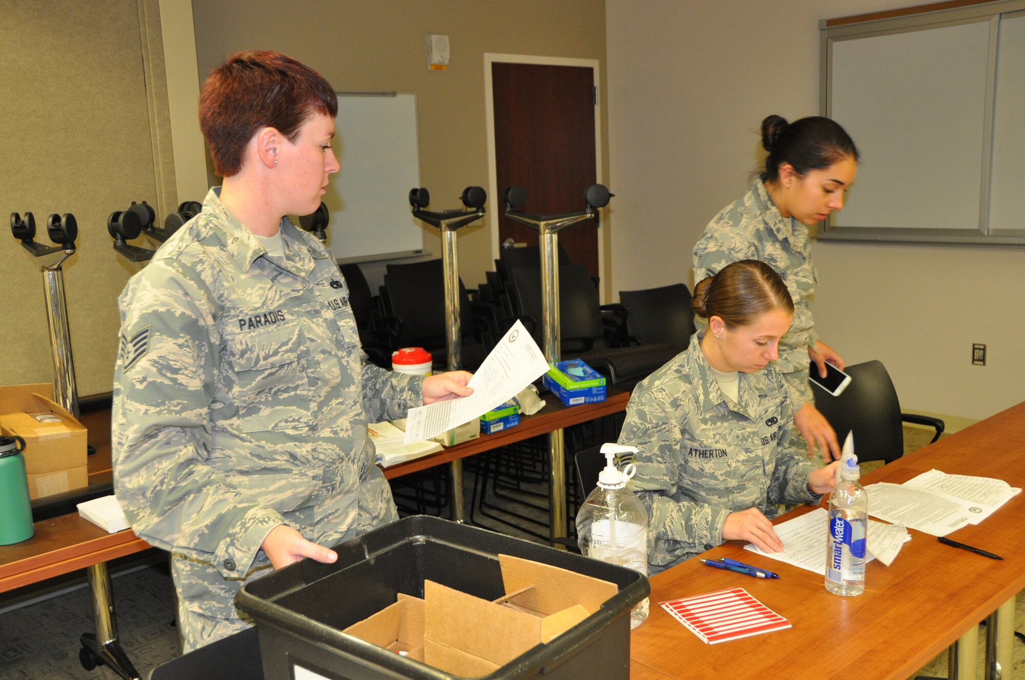 Staff Sgt. Jennifer Paradis of the 507th Medical Squadron’s Drug Demand Reduction team ensures paperwork is in order during urinalysis testing Oct. 3, 2015, at Tinker Air Force Base, Okla. The DDR team is responsible for testing Tinker Airmen within the Reserve, which includes the 507th Air Refueling Wing, the 513th Air Control Group and the 35th Combat Communication Squadron. (U.S. Air Force photo/Tech. Sgt. Charles Taylor)