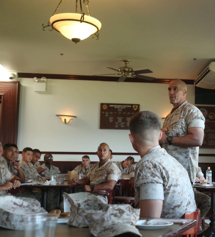 Maj. Gen. Richard L. Simcock, the commanding general of 3rd Marine Division, III Marine Expeditionary Force, speaks to his Marines about Marine Corps readiness at Legends Officers' Club on Camp Courtney, Okinawa, Japan, Oct. 14, 2015. The round-table event was organized to educate Marines about the importance of mission readiness, the need for qualified Marines to re-enlist, and how noncommissioned officers are responsible for their Marines. “Warfighting is the number one priority of the division,” said Simcock. “All actions we take, both as a division and as major subordinate elements, should support the priority.” Simcock is from San Mateo, California. 