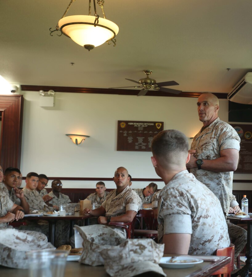 Maj. Gen. Richard L. Simcock, the commanding general of 3rd Marine Division, III Marine Expeditionary Force, speaks to his Marines about Marine Corps readiness at Legends Officers' Club on Camp Courtney, Okinawa, Japan, Oct. 14, 2015. The round-table event was organized to educate Marines about the importance of mission readiness, the need for qualified Marines to re-enlist, and how noncommissioned officers are responsible for their Marines. “Warfighting is the number one priority of the division,” said Simcock. “All actions we take, both as a division and as major subordinate elements, should support the priority.” Simcock is from San Mateo, California. 