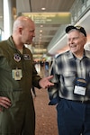 Nine Airmen of the Alaska Air National Guard's 249th Airlift Squadron connected with more than 20 World War II and Korean War veterans, assisting them at Ted Stevens International Airport on Oct. 13, 2015. The Alaska veterans were participants of the Last Frontier Honor Flight, an organization taking them to Washington, D.C., to see for the first time the monuments erected there to honor those who served during those conflicts.