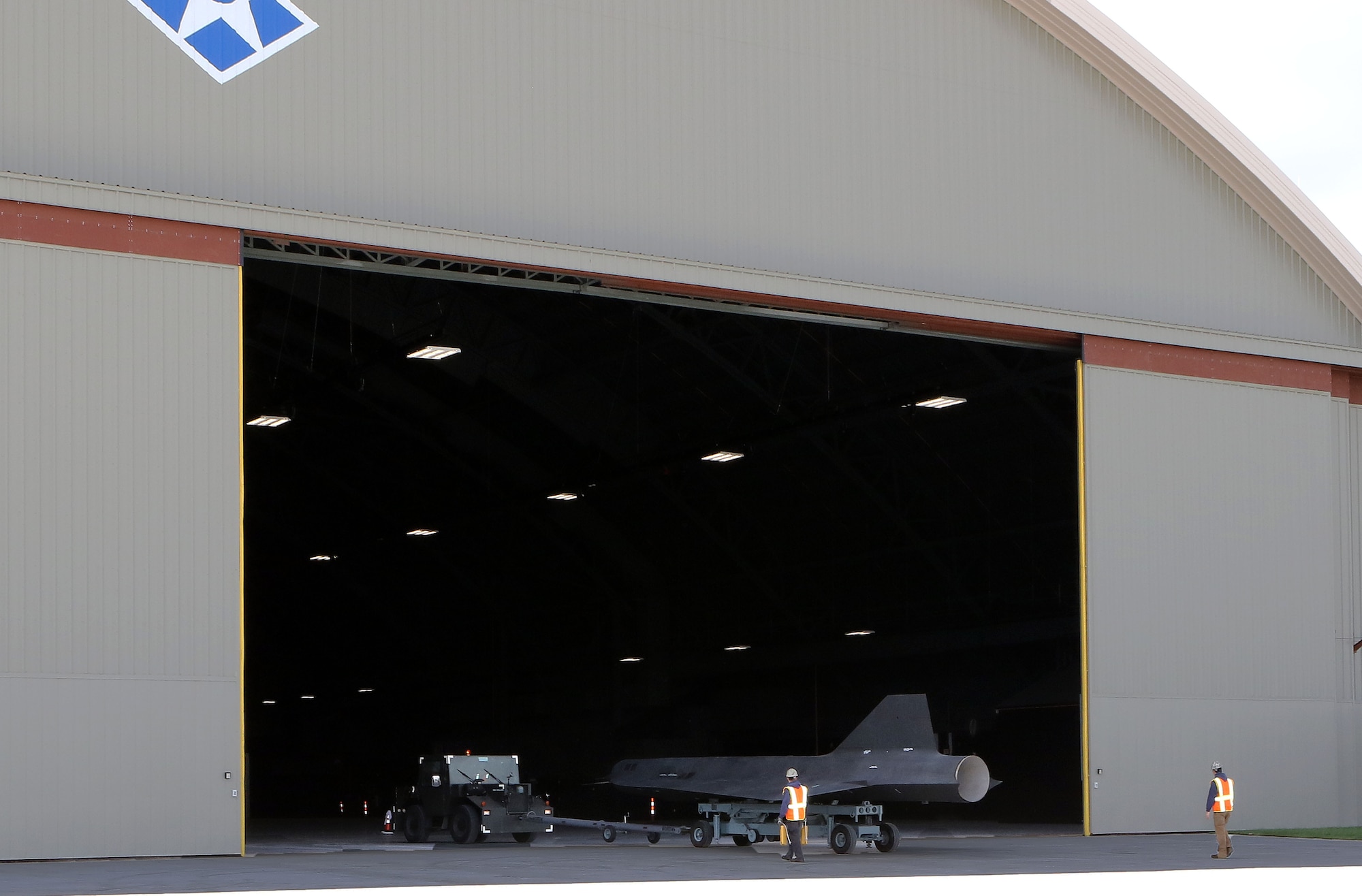 Restoration staff move the Lockheed D-21B into the new fourth building at the National Museum of the U.S. Air Force on Oct. 13, 2015. (U.S. Air Force photo by Don Popp) 