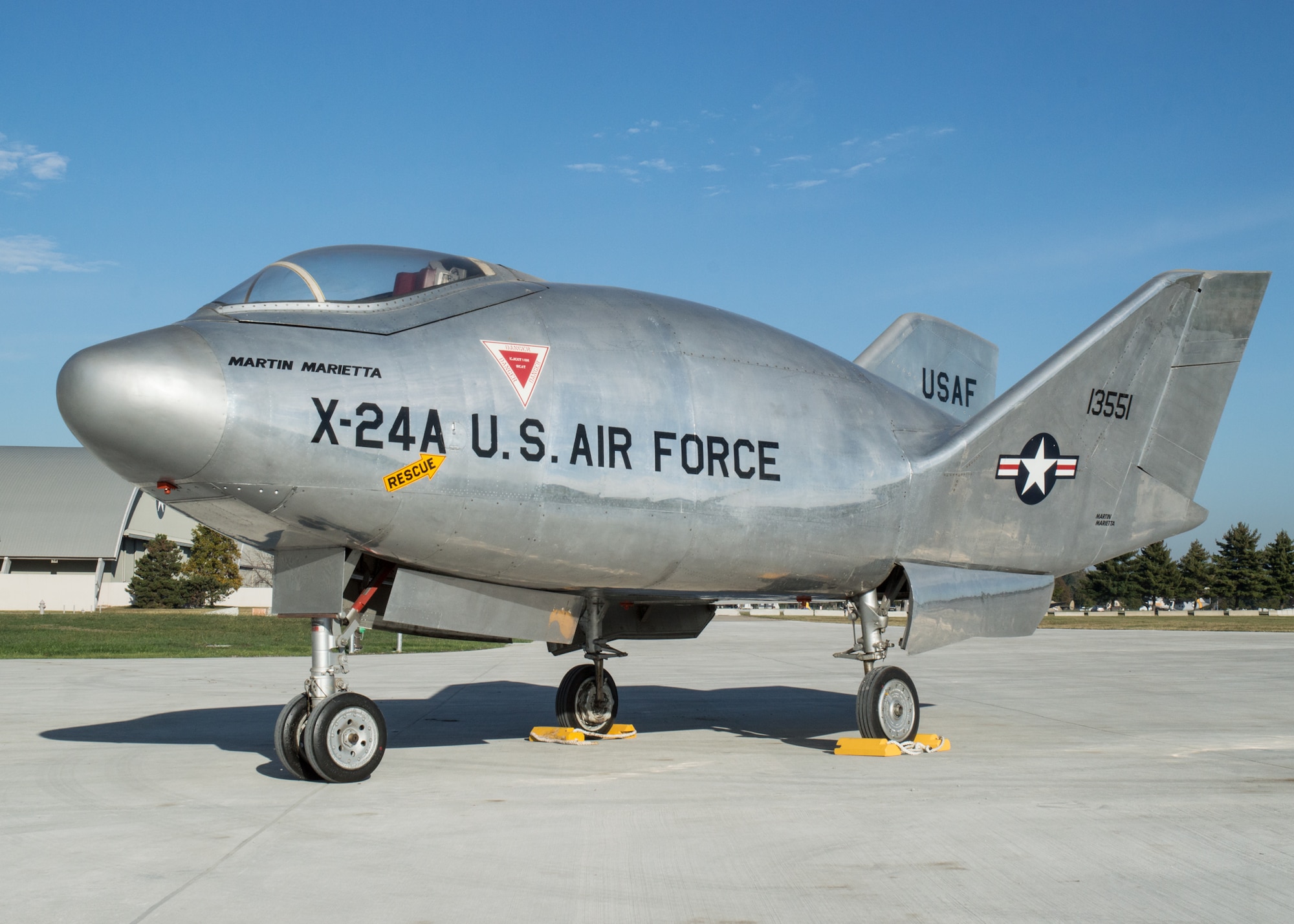 Restoration staff move the Martin X-24A into the new fourth building at the National Museum of the U.S. Air Force on Oct. 14, 2015. (U.S. Air Force photo by Ken LaRock)