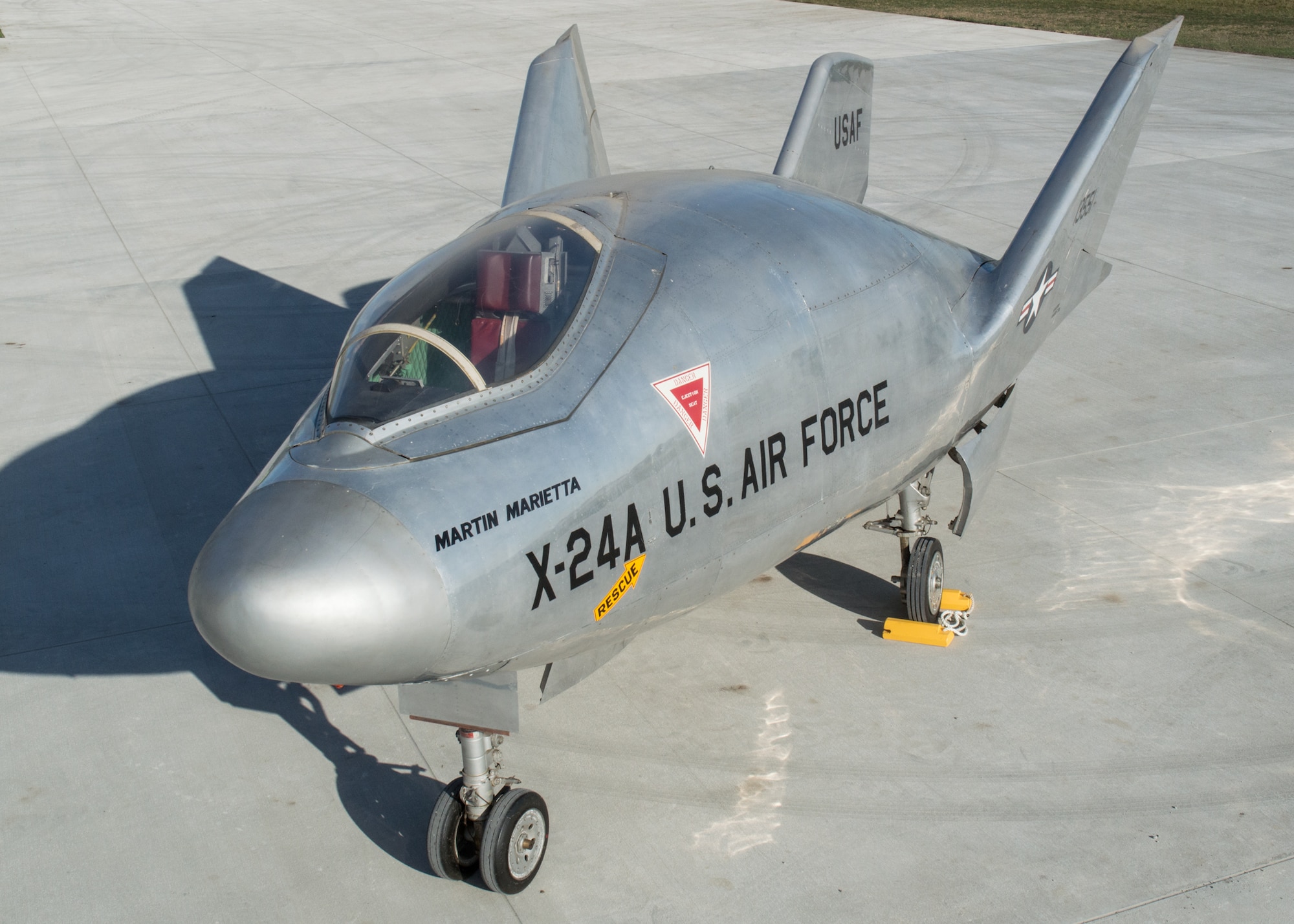 Restoration staff move the Martin X-24A into the new fourth building at the National Museum of the U.S. Air Force on Oct. 14, 2015. (U.S. Air Force photo by Ken LaRock)