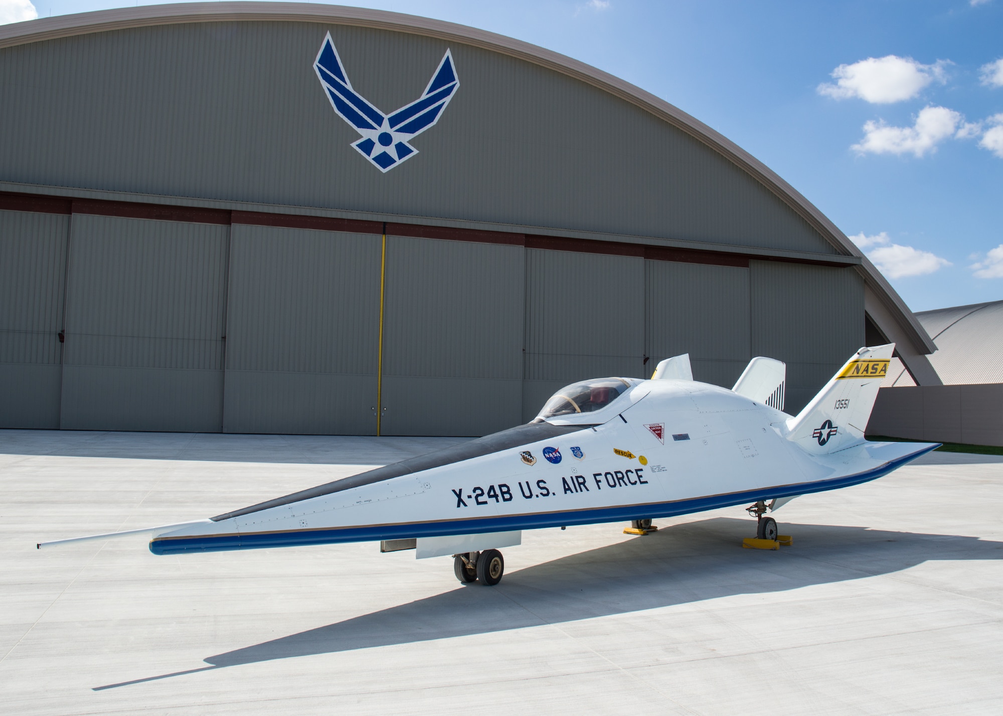 Restoration staff move the Martin X-24B into the new fourth building at the National Museum of the U.S. Air Force on Oct. 14, 2015. (U.S. Air Force photo by Ken LaRock)