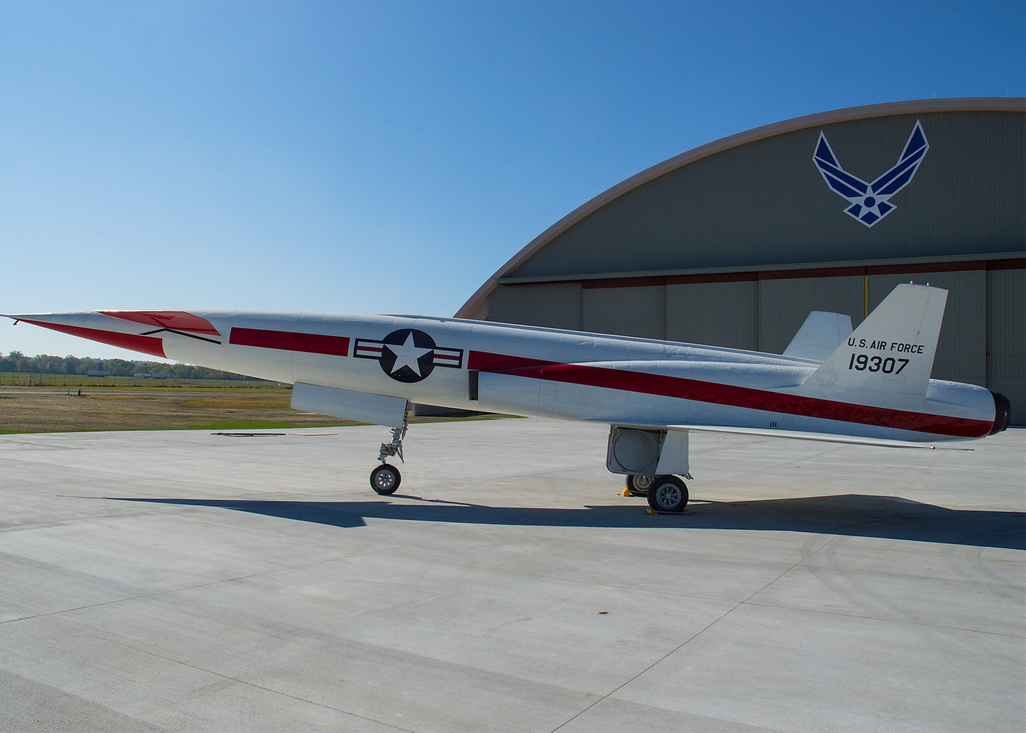 Restoration staff move the North American X-10 into the new fourth building at the National Museum of the U.S. Air Force on Oct. 14, 2015. (U.S. Air Force photo by Ken LaRock)