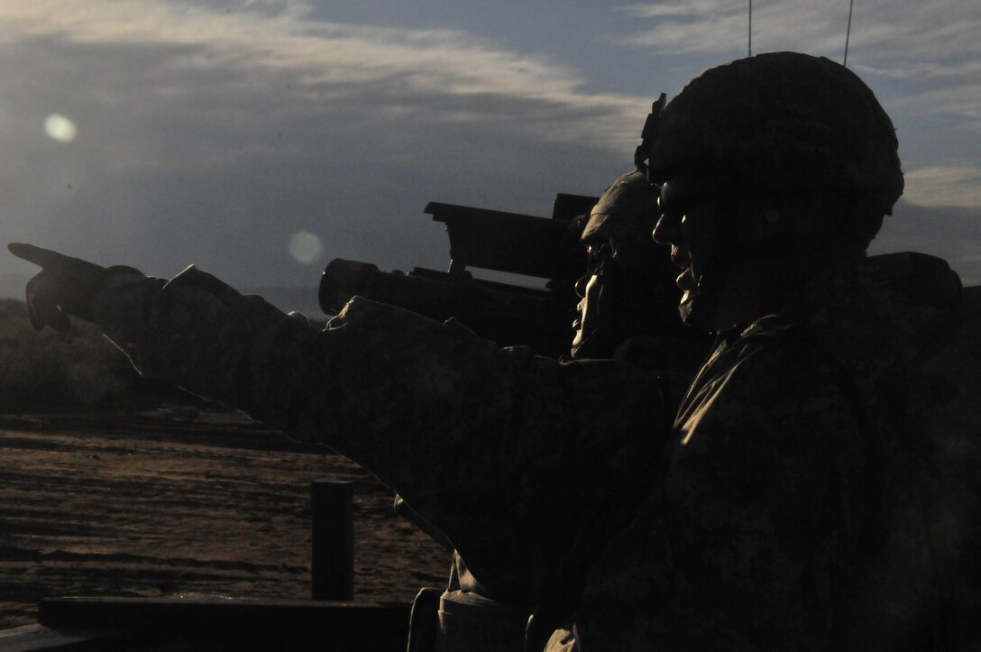 Mississippi Army National Guardsmen locate a drone while preparing to shoulder-fire a Stinger missile ground-to-air during a live-fire exercise on Fort Bliss, Texas, Oct. 7, 2015. Mississippi Army National Guard photo by Staff Sgt. Shane Hamann