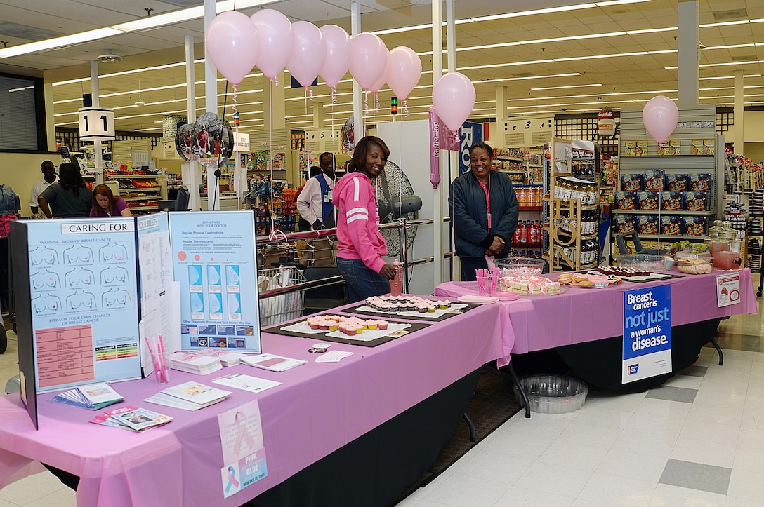 As patrons enter Marine Corps Logistics Base Albany’s Commissary, Oct. 16, the first thing they saw was a small section decorated in pink.  Important information, buttons, different kinds of sweets and pink lemonade sat on a long table. Commissary employees greeted patrons, welcoming them to the Breast Cancer Awareness “Pink Out” Extravaganza. The event was held by the employees to promote awareness and support several fellow employees battling cancer.