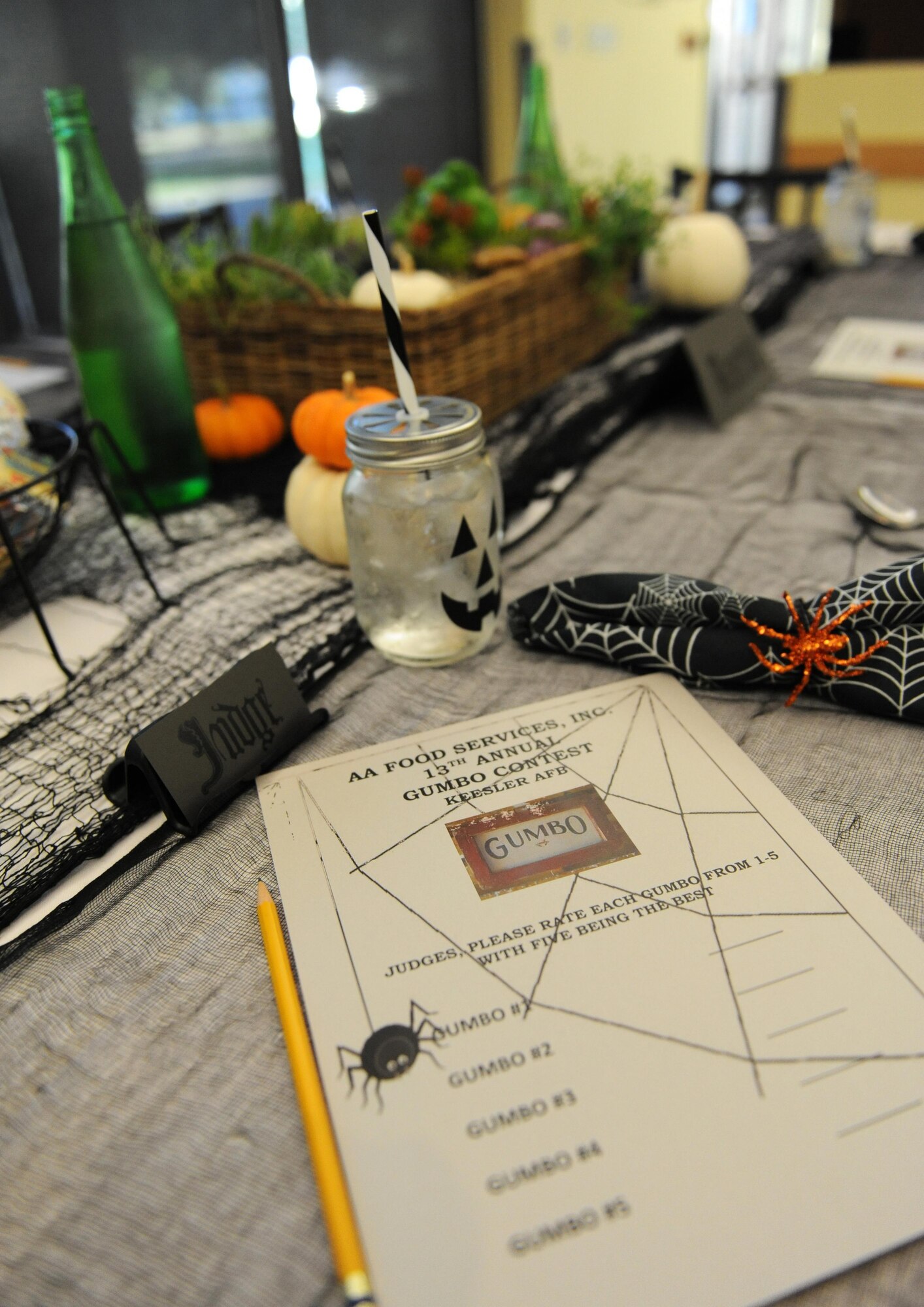 A scoring sheet sits on a Halloween decorated table during the 13th Annual Gumbo Contest at the Live Oak Dining Facility Oct. 15, 2015, Keesler Air Force Base, Miss. Hosted by the 81st Force Support Squadron and AA Food Service, the contest ended with a tie between the Azalea and Live Oak Dining Facilities. (U.S. Air Force photo by Kemberly Groue)