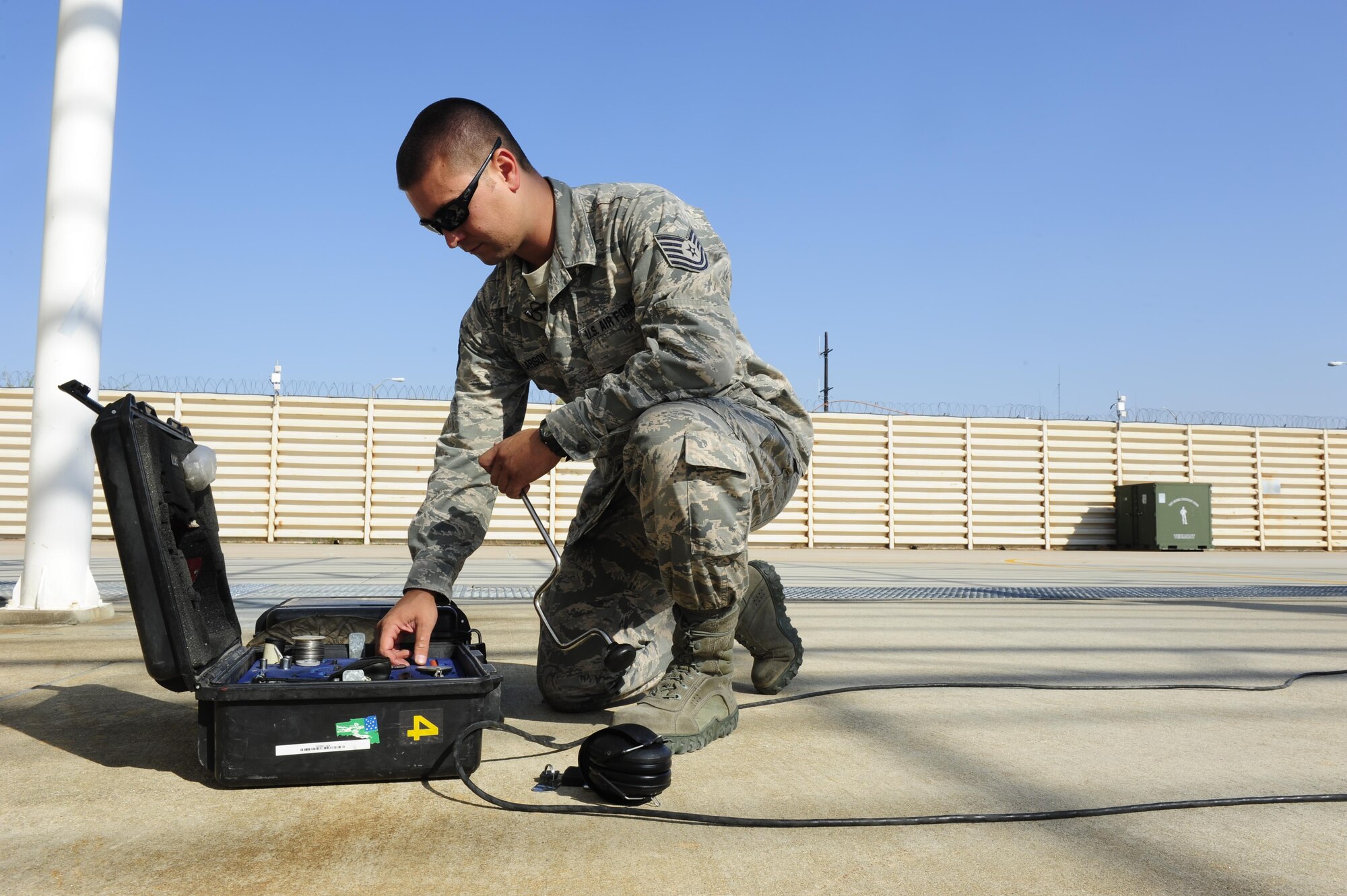 U.S. Air Force Tech. Sgt. Brett Larson, 134th Expeditionary Fighter Squadron F-16 Fighting Falcon crew chief, Vermont Air National Guard, retrieves a tool from his toolbox at Kunsan Air Base, Republic of Korea, Oct. 6, 2015. The 134th EFS was redeployed from Kadena Air Base, Japan to Kunsan AB as part of a theater security package. In an effort to underscore the U.S. commitment to regional security and stability, the 134th Expeditionary Fighter Squadron deployed to Kunsan as part of a rotational theater security package. (U.S. Air Force photo by Staff Sgt. Nick Wilson/Released) 
