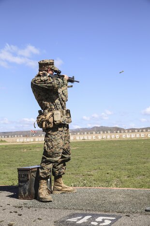 Recruit Dakota R. Justice, Hotel Company, 2nd Recruit Training Battalion, aims in at the target in the standing position during the rifle range at Edson Range, Marine Corps Base Camp Pendleton, Calif., Oct. 8. Recruits fired from the 200, 300 and 500-yard lines during qualification. Today, all males recruited from west of the Mississippi are trained at MCRD San Diego. The depot is responsible for training more than 16,000 recruits annually. Hotel Company will graduate Nov. 20.