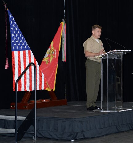 Col. Brian G. Hughes, (center) commanding officer, Blount Island Command and Marine Corps Support Facility Blount Island in Jacksonville, Fla., speaks to Marines, civilian-Marines and contractor employees during a Voluntary Protection Program Star sites ceremony, Oct. 16.