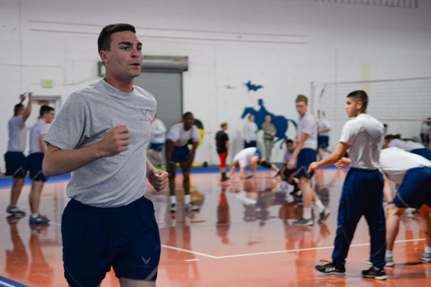 Airman 1st Class Jacob Canterbury, 790th Missile Security Forces Squadron, runs in the Independence Hall Fitness Center, Oct. 14, 2015, while Airmen complete other portions of the Warrior Workout in memory of Airman 1st Class Leebernard Chavis. Every Airmen that took on the challenge completed the memorial workout, remaining silent from beginning to end in remembrance of those defenders that have fallen in the line of duty.