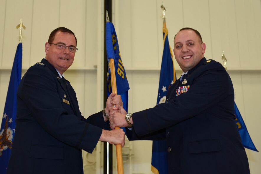 Major David Kunca assumes command of the 911th Aircraft Maintenance Squadron, Oct. 3, 2015 at the Pittsburgh International Airport Air Reserve Station, Pa. Kunca became the new squadron commander of the 911 AMXS after relinquishing command of the 911th Maintenance Squadron. (U.S. Air Force photo by Senior Airman Marjorie A. Bowlden)