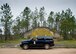 A range police vehicle rolls by a hardened bunker while out on patrol Oct. 6 at Eglin Air Force Base, Fla.  The range police is responsible for the safety and security of Eglin range’s mission, people and environment.  (U.S. Air Force photo/Samuel King Jr.)