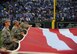 Airmen from Whiteman Air Force Base, Mo., perform a flag ceremony at Kauffman Stadium in Kansas City, Mo., Oct. 8, 2015. More than 20 service members held the flag before game one of the American League Divisional Series between the Houston Astros and the Kansas City Royals. (U.S. Air Force photo by Senior Airman Joel Pfiester/Released)
