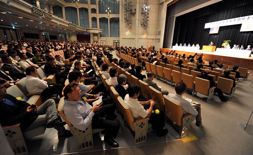 A total of 723 civilian employees from U.S. Forces, Japan facilities in Okinawa receive the Joint Length of Service Award at the Okinawa Convention Center in Ginowan City, Japan, Oct. 15, 2015. The Okinawa Ministry of Defense along with USFJ recognized these members during a ceremony for long-service employees who have 10, 20, 30 and 40 years of service with the USFJ facilities in Okinawa. (U.S. Air Force photo by Naoto Anazawa)