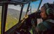 Capt. Matthieu Rigollet, 36th Airlift Squadron C-130 Hercules pilot, flies over the coast of Japan Oct. 14, 2015. The crew flew past Mt. Fuji and performed a practice bundle drop as part of Yokota’s ongoing mission to keep all personnel ready to perform real world operations. (U.S. Air Force photo by Airman 1st Class Elizabeth Baker/Released)