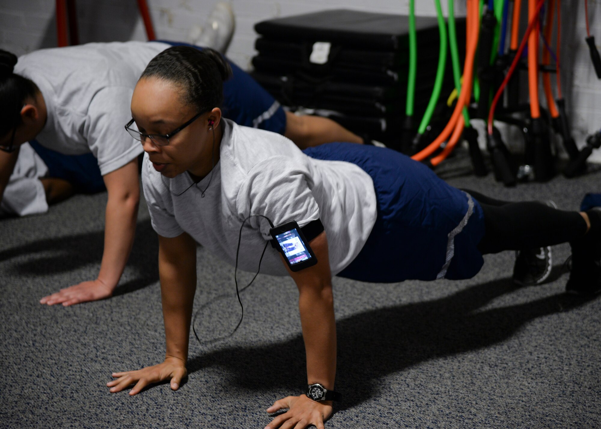 Tech. Sgt. Gina Scott, 90th Security Forces Squadron, performs burpees in the Independence Hall Fitness, Oct. 14, 2015, during the first part of the Warrior Workout Center in memory of Airman 1st Class Leebernard Chavis. The workout consisted of 150 burpees, a one mile run and 150 squat thrusts. 