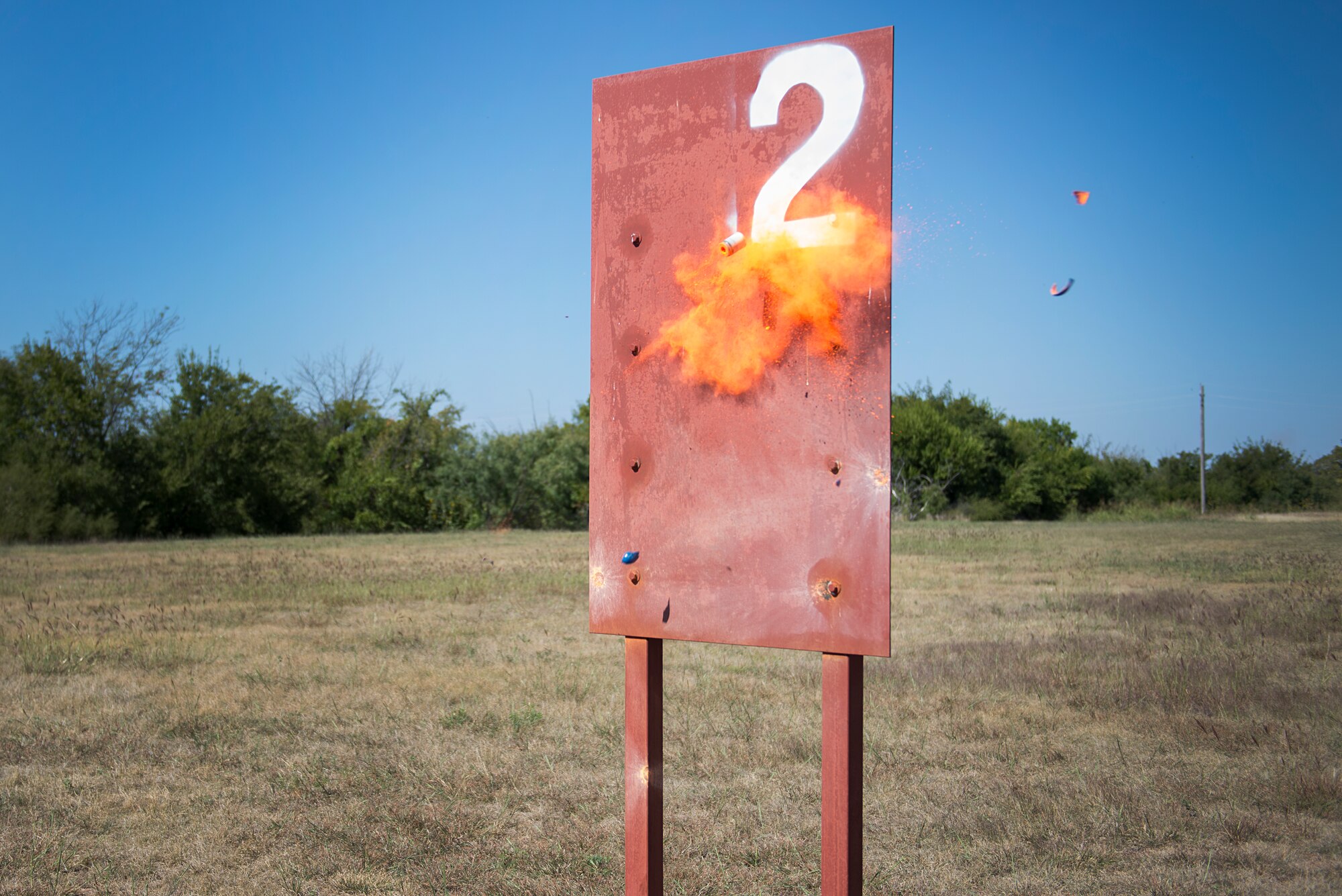 A 203 grenade round strikes a newly built target at the 82nd Security Forces combat arms training range on Sheppard Air Force Base, Texas, Oct. 6, 2015. This training range was recently rebuilt to increase training effectiveness and realism. (U.S. Air Force photo/Senior Airman Kyle Gese)