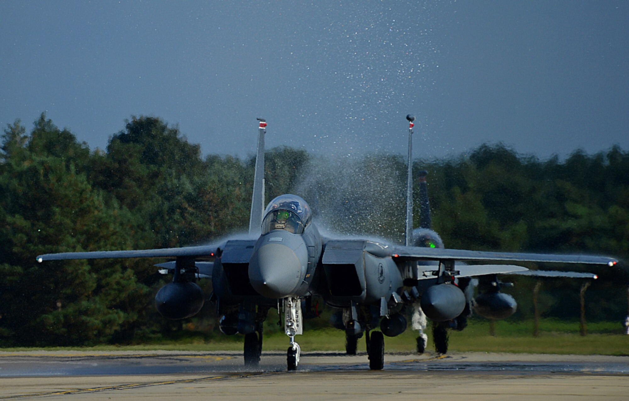 F-15E Strike Eagles assigned to the 494th Fighter Squadron, taxi down the runway at Royal Air Force Lakenheath, England, Oct. 12, 2015. While deployed, the Panthers flew 1,651 sorties and dropped more than 1,700 bombs in support of U.S. Central Command operations. (U.S. Air Force photo by Senior Airman Erin O'Shea/Released)