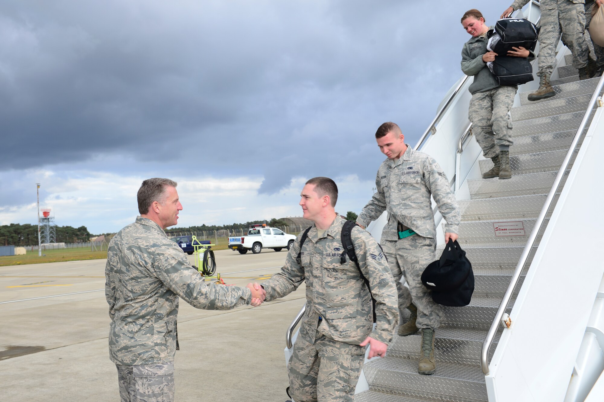 Families and base leadership welcome home the pilots, weapon systems officers, maintainers and support personnel of the 494th Fighter Squadron and Aircraft Maintenance Unit at Royal Air Force Lakenheath, England, Oct. 14, 2015. While deployed, the Panthers flew 1,651 sorties and dropped more than 1,700 bombs in support of U.S. Central Command operations. (U.S. Air Force photo by Senior Airman Nigel Sandridge/Released)