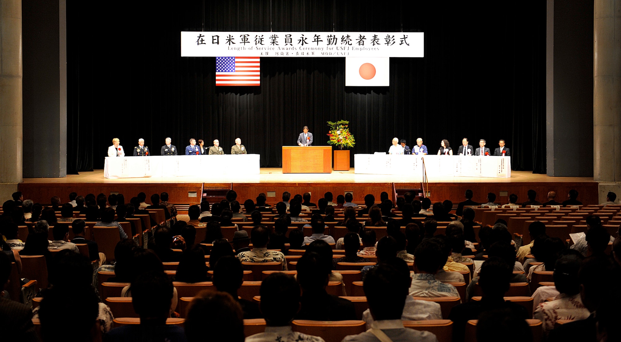 The Okinawa Ministry of Defense along with the U.S. Forces, Japan conduct a Joint Length of Service Award ceremony for long-service employees who have 10, 20, 30 and 40 years of service with USFJ facilities in Okinawa at the Okinawa Convention Center in Ginowan City, Japan, Oct. 15, 2015. The USFJ employees are hired by the Government of Japan (minister of defense) for the purpose of accomplishing the mission of USFJ while working at USFJ facilities. (U.S. Air Force photo by Naoto Anazawa)