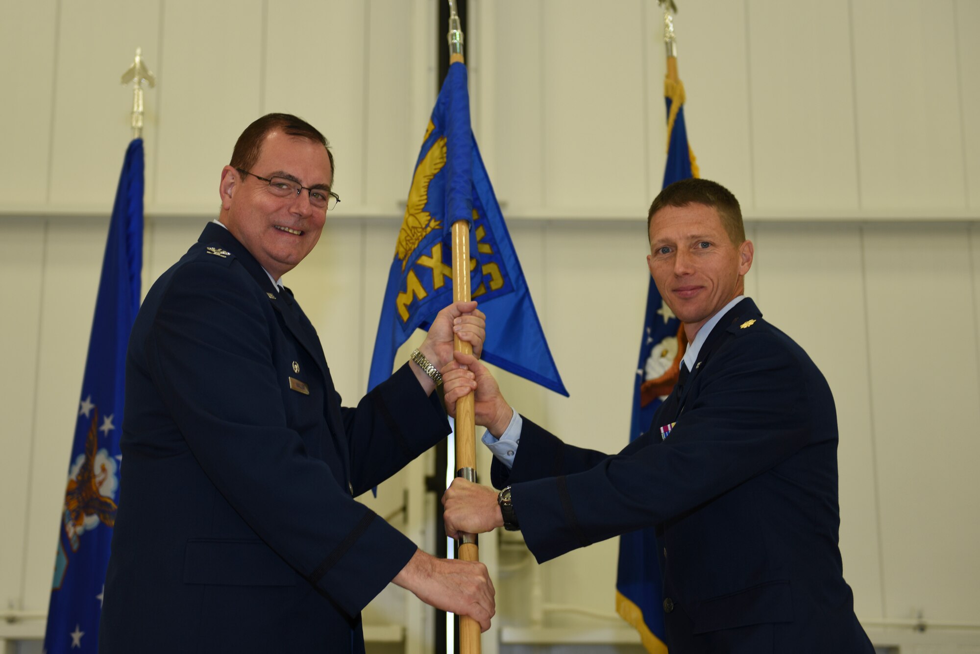 Major William Chapman assumes command of the 911th Maintenance Squadron, Oct. 3, 2015 at the Pittsburgh International Airport Air Reserve Station, Pa. Chapman became the new squadron commander of the 911 MXS after relinquishing command of the 434th Maintenance Squadron at Grissom Air Reserve Base, Ind. (U.S. Air Force photo by Senior Airman Marjorie A. Bowlden)