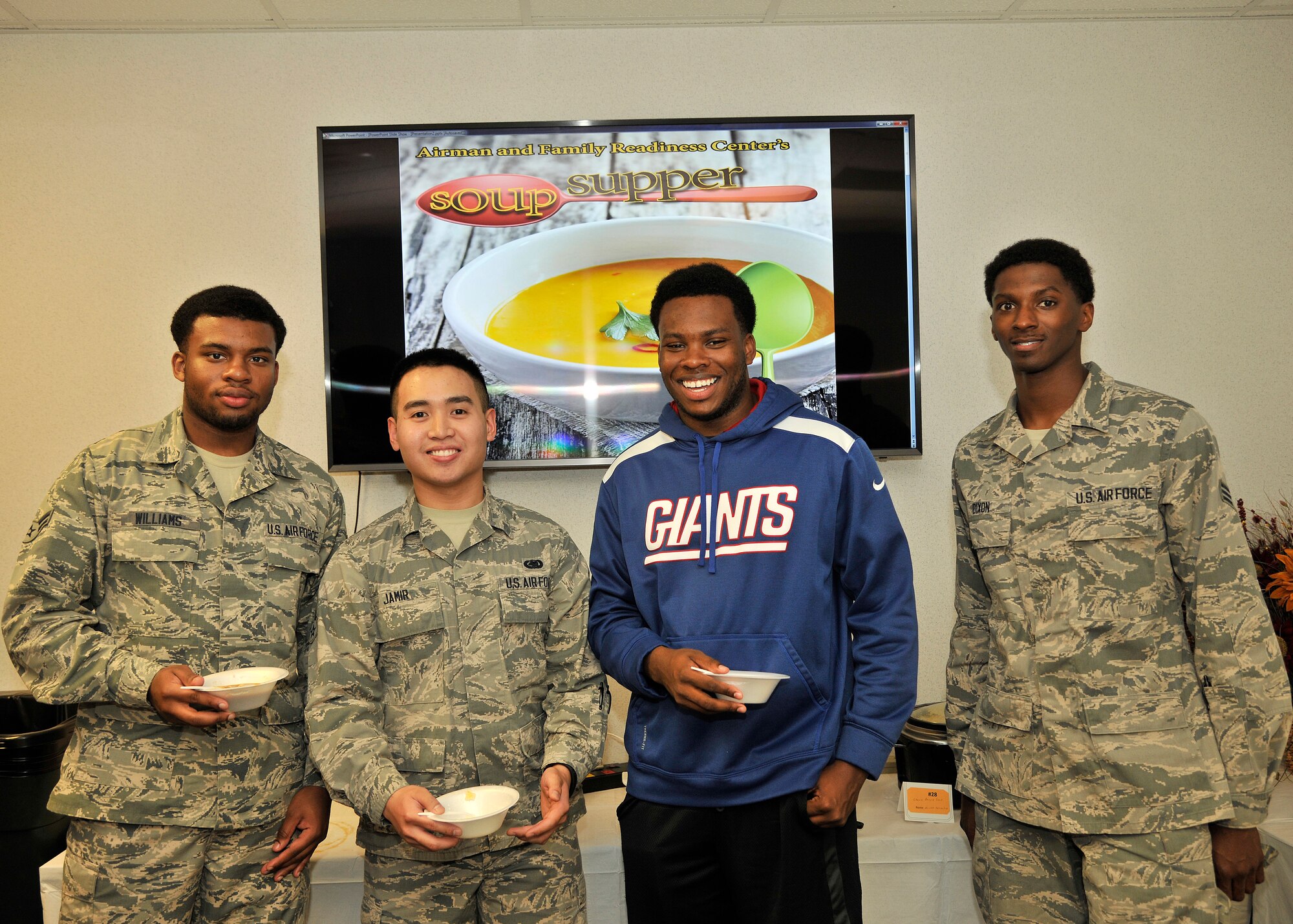 Airmen from the 319th Air Base Wing gathered and enjoyed several different homemade soups from base residents at the Airman and Family Readiness Center Soup Supper on Grand Forks Air Base, North Dakota, Oct. 15, 2015. The event is designed to boost base morale of Airmen, civilians, employees, spouses and children. (U.S. Air Force photo by Senior Airman Xavier Navarro/Released) 