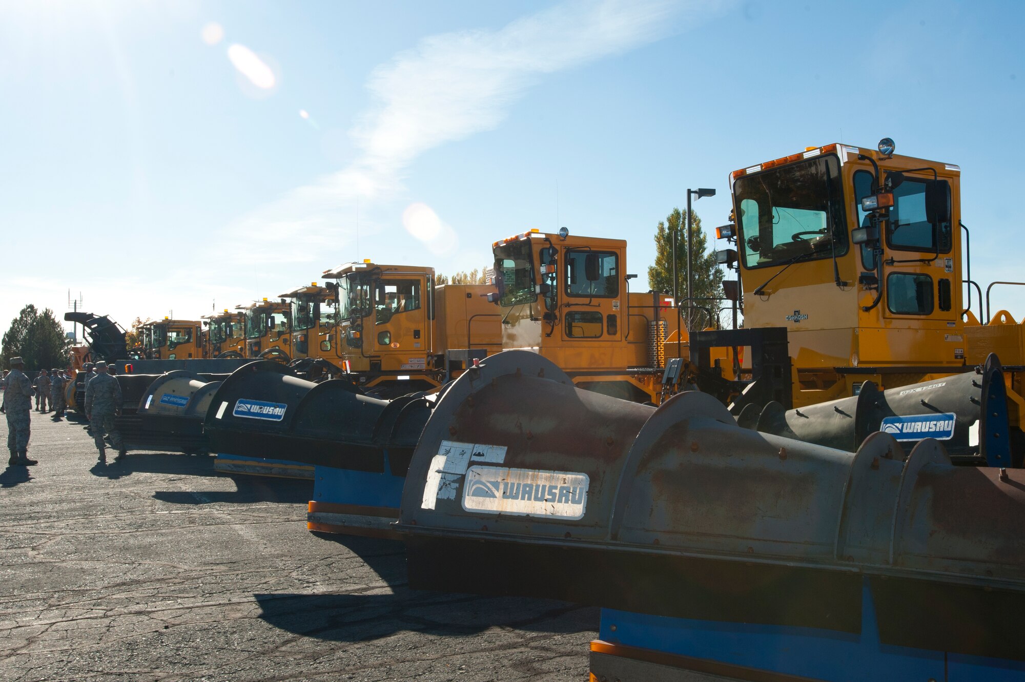 Airmen from the 92nd Civil Engineer Squadron join base leadership to inspect 20 pieces of snow removal equipment before the annual Fairchild tradition known as the “Snow Parade” Oct. 14, 2015, at Fairchild Air Force Base, Wash. The Snow Parade is an event that symbolizes the formal beginning of the snow removal season and is a tradition that has been around for more than 60 years. (U.S. Air Force photo/Staff Sgt. Veronica Montes)