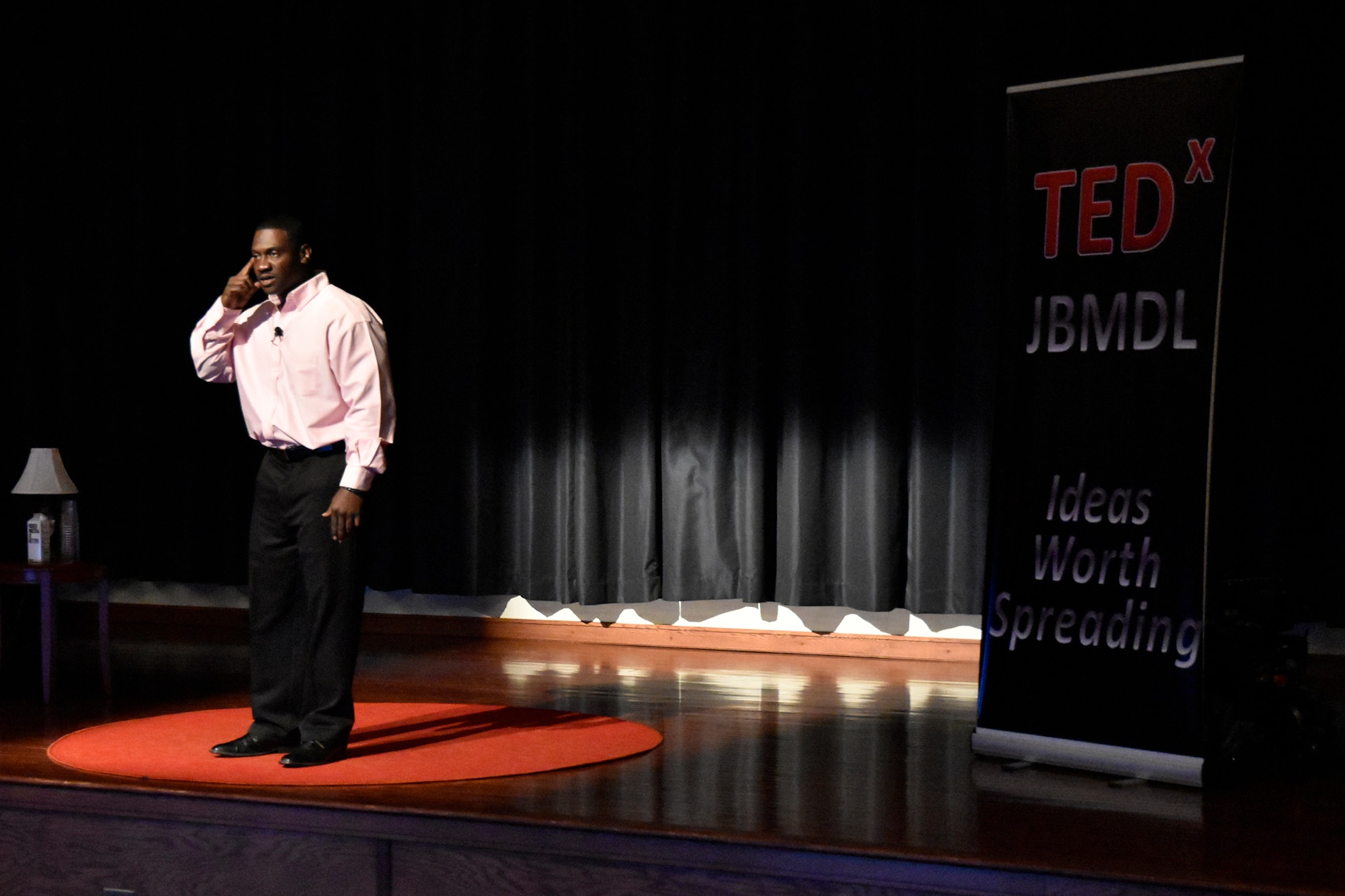 U.S. Army Sergeant First Class Donald Rivers addresses the audience during the TEDxJBMDL here Oct. 8, 2015. Rivers performed several poems during his segment titled Making a Change as he spoke about resiliency and his time in service. (U.S. Navy photo by Sherry Jacob) 