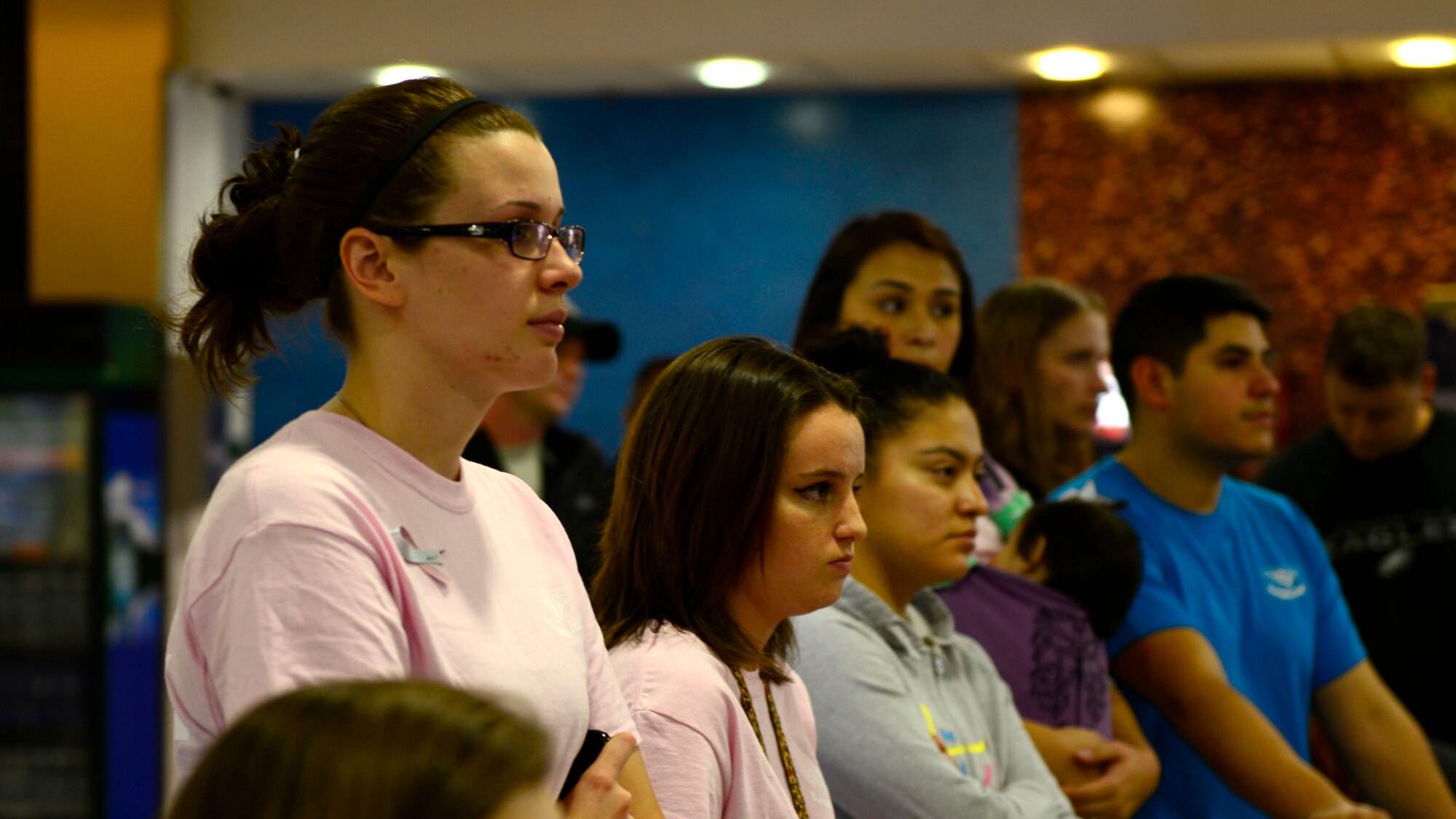Attendees listen to opening remarks during the Airborne Angel: Child and Pregnancy Loss group’s Wave of Light Memorial Walk, Oct. 15, 2015 at Aviano Air Base, Italy. Wave of Light is an hour of silence to honor those families who have suffered the loss of a child. (U.S. Air Force photo by Senior Airman Areca T. Bell/Released)