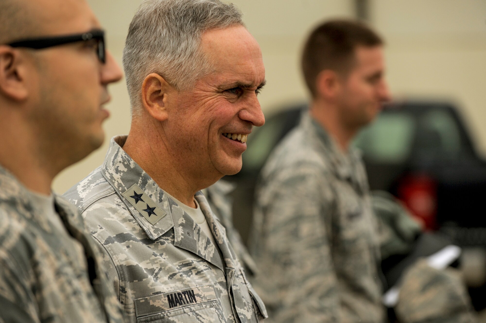 U.S. Air Force Maj. Gen. Frederick Martin, USAF Expeditionary Center commander, smiles outside the 726th Air Mobility Squadron building Oct. 14, 2015, at Spangdahlem Air Base, Germany. Martin received a briefing about the cargo capabilities 726th AMS during his visit. (U.S. Air Force photo by Senior Airman Rusty Frank/Released)