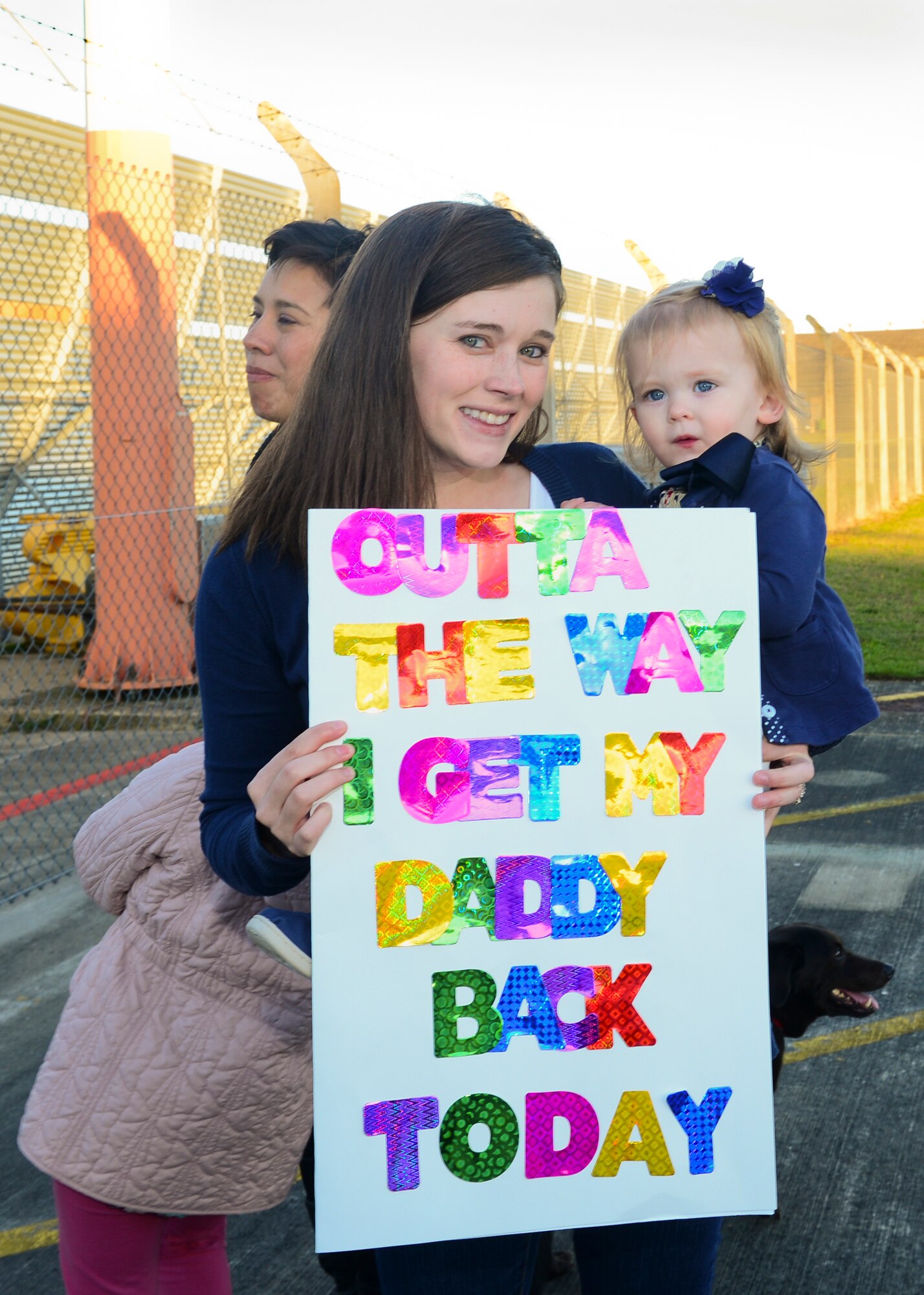Family members gather on the RAF Lakenheath flightline Sept. 30, 2015, to welcome back Airmen of the 56th Rescue Squadron as they return from a deployment. The 56th and 57th RQSs deployed pilots, special mission aviators, pararescuemen and combat rescue officers, along with HH-60G Pave Hawk helicopters, supported by maintainers from various squadrons across the 48th Maintenance Group. (U.S. Air Force photo by Senior Airman Nigel Sandridge/Released)