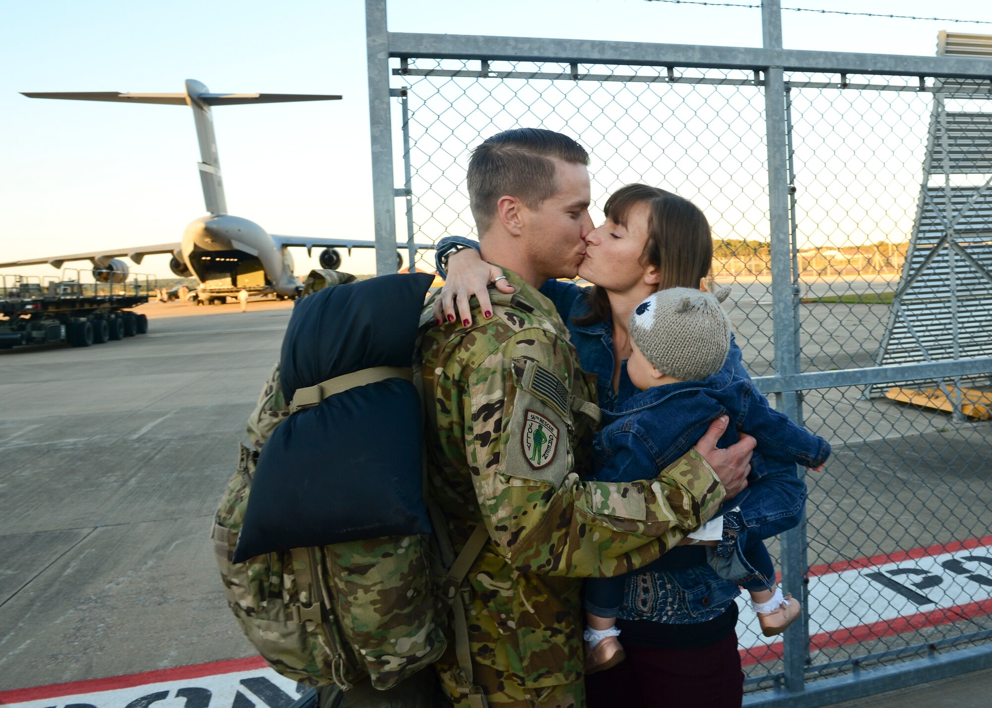 Family members gather on the RAF Lakenheath flightline Sept. 30, 2015, to welcome back Airmen of the 56th Rescue Squadron as they return from a deployment. The 56th and 57th RQSs deployed pilots, special mission aviators, pararescuemen and combat rescue officers, along with HH-60G Pave Hawk helicopters, supported by maintainers from various squadrons across the 48th Maintenance Group. (U.S. Air Force photo by Senior Airman Nigel Sandridge/Released)
