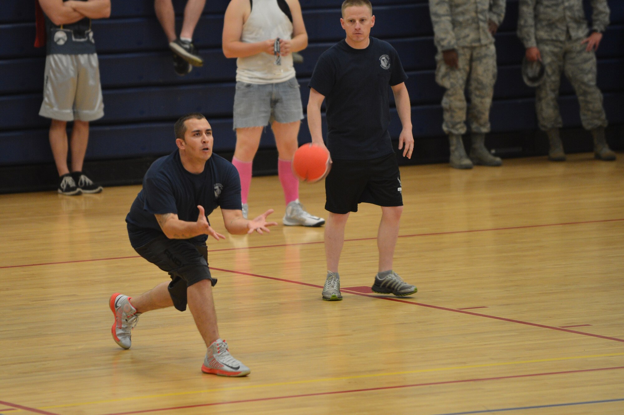 A Team Buckley member catches a dodgeball during the Combined Federal Campaign dodgeball tournament at the Fitness Center Oct. 13, 2015 on Buckley Air Force Base, Colo. Seventeen teams signed up to compete in the tournament, which helped raise more than $400. (U.S. Air Force photo by Staff Sgt. Darren Scott/Released)