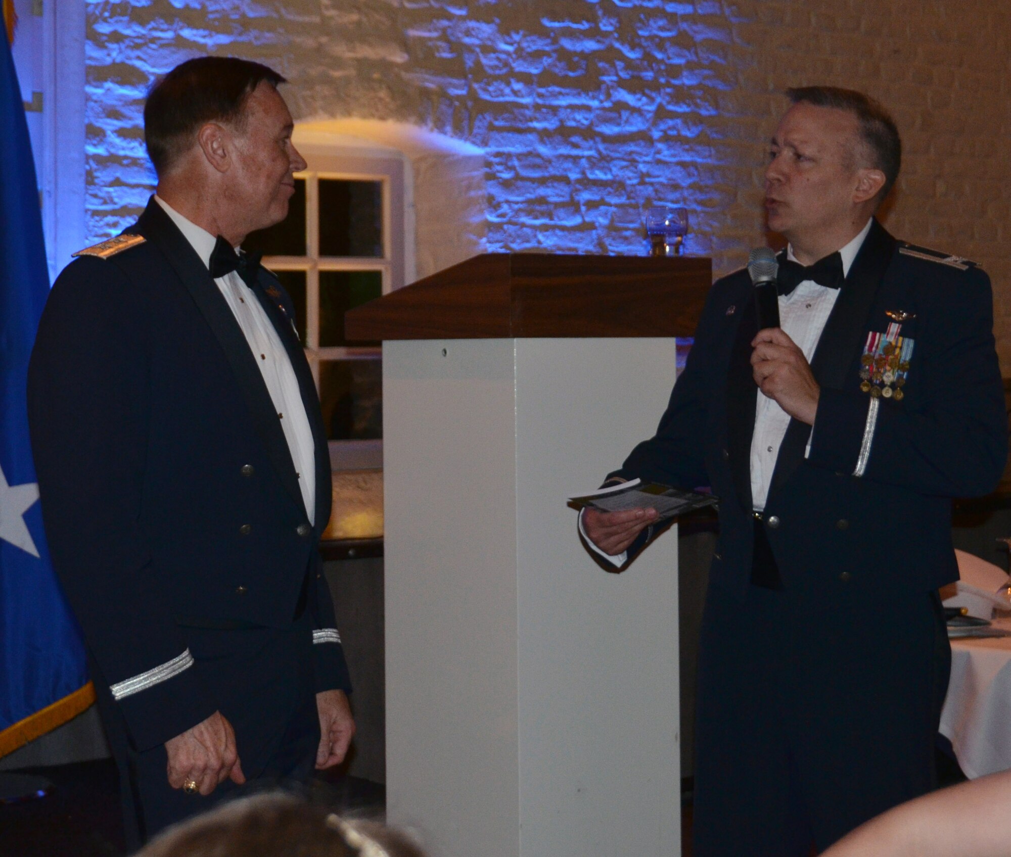 Colonel Frank D. Samuelson, commander of the E-3A Component's
Logistic Wing, speaks to Air Force District of Washington Commander Maj.
Gen. Darryl Burke at the Tri-Border U.S. Air Force Ball in Geilenkirchen,
Germany Oct. 9, 2015. Burke, Commander of NATO's E3-A Component Flying
Squadron One from 2001-2003, spoke about the rich history of the U.S. Air
Force and how Airmen of today are rising to the occasion to confront future
challenges. AFDW provides full-spectrum operational support including
personnel, legal, financial, contracting, and aircrew management to
approximately 26,000 Airmen across the globe. (Courtesy Photo)

