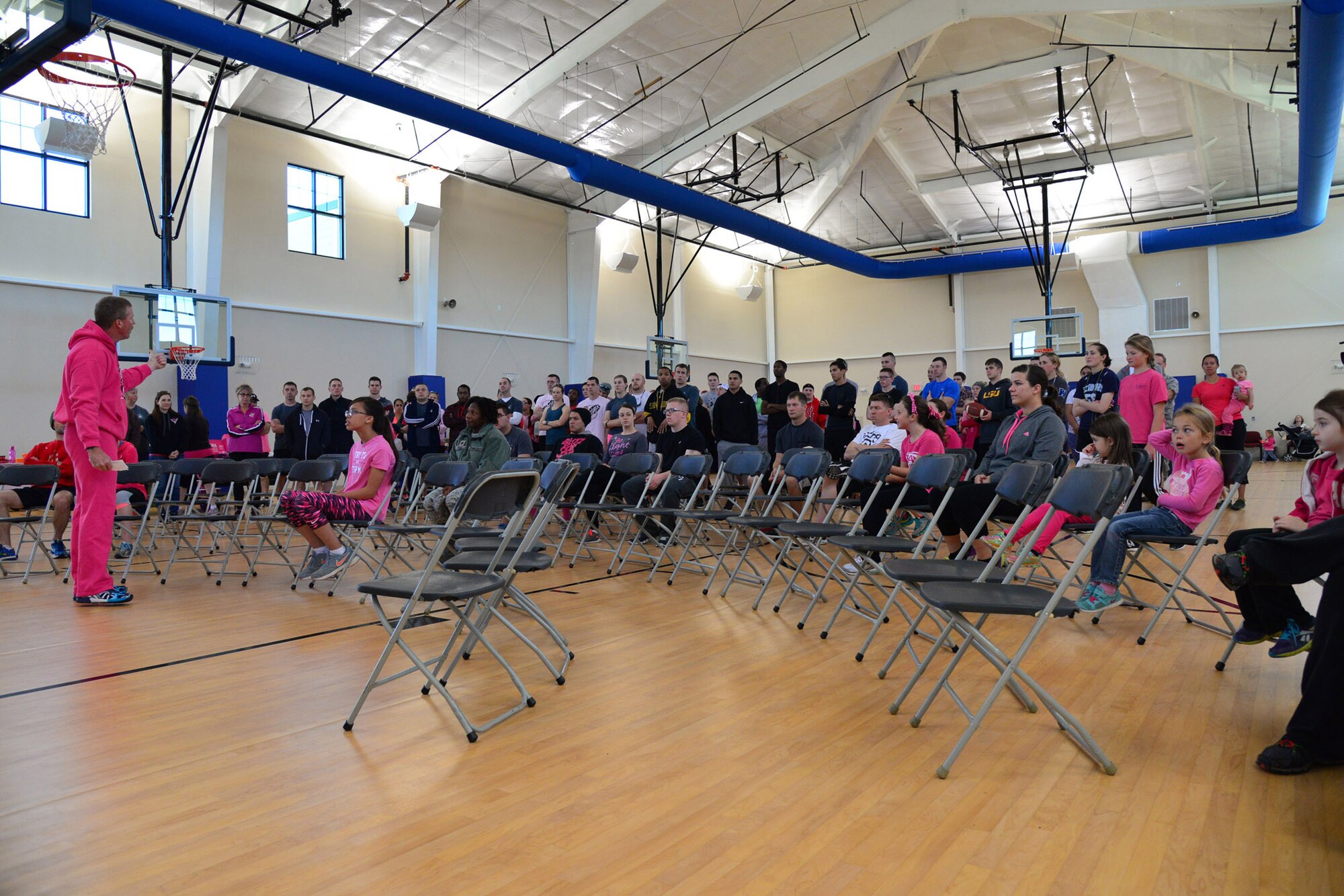 Kirk Clark, 341st Medical Group health promotions director, speaks to the audience at the breast cancer awareness walk and run Oct. 15, 2015, at Malmstrom Air Force Base, Mont. Clark told the group there are nearly 2.8 million breast cancer survivors in the United States. (U.S. Air Force photo/Airman Daniel Brosam)