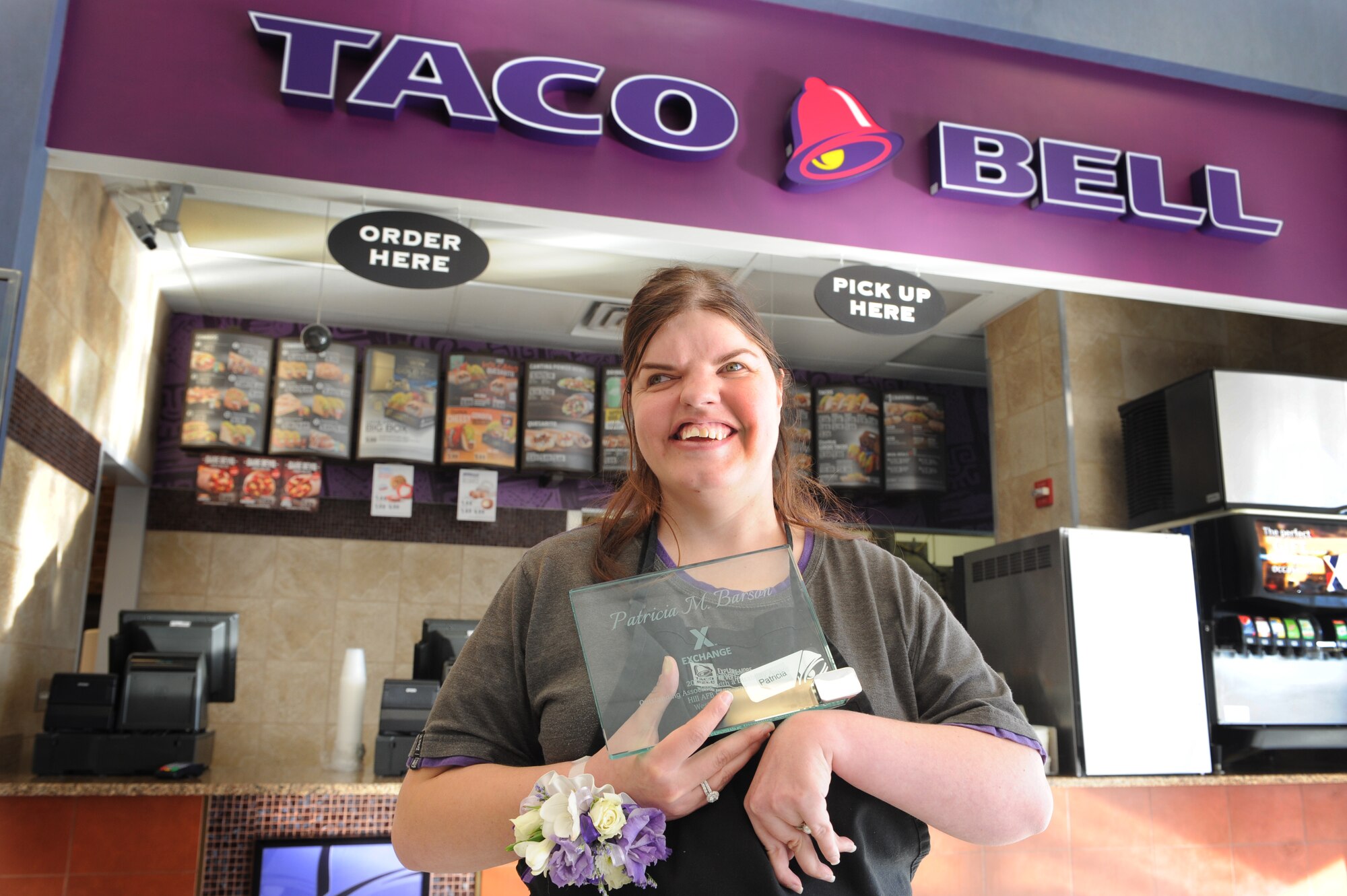 Patricia Barson, who works at Taco Bell in Hill's Exchange Food Court, was honored today as one of the Department of Defense’s Outstanding Employees with a Disability. Patricia was selected for the award from among AAFES 32,000 worldwide employees.(U.S. Air Force photo/Micah Garbarino)