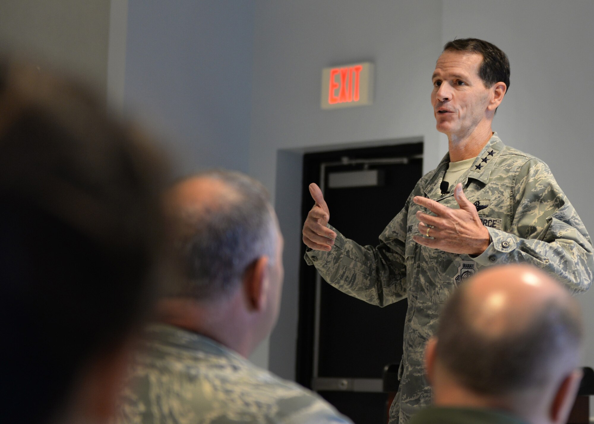 Lt. Gen. Stanley E. “Sid” Clarke III, the director of the Air National Guard, speaks with members of the 157th Air Refueling Wing during an all-call at Pease Air National Guard Base, New Hampshire, Oct. 15. Clarke said during the all-call that he believes the Air Force selected the right organization to lead the Air National Guard through the transition of the KC-135 to the KC-46A Pegasus air refueling aircraft. The new weapon system is expected to arrive at Pease in 2018. (U.S. Air National Guard photo by Senior Airman Kayla Rorick)