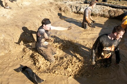 COATESVILLE, Penn. - Tough Mudders work through an obstacle during Tough Mudder Philly Oct. 17 in Coatesville, Penn. The U.S. Army Reserve was one of the sponsors for the event. (U.S. Army photo by Sgt. Hector Membrano)