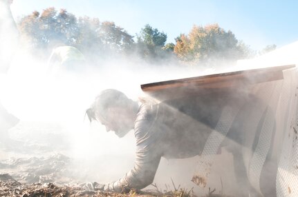 COATESVILLE, Penn. - A Tough Mudder run through an obstacle at Tough Mudder Philly Oct. 17 in Coatesville, Penn. The U.S. Army Reserve was one of the sponsors for the event. (U.S. Army photo by Sgt. Hector Membreno)