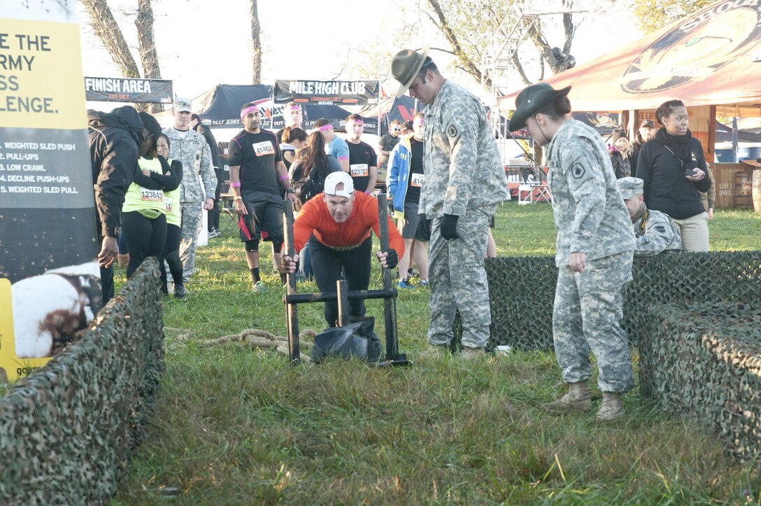 COATESVILLE, Penn. - A Tough Mudder competes in the Army Reserve physical fitness challenge during the Tough Mudder Philly event Oct. 17 in Coatesville, Penn. The U.S. Army Reserve was one of the sponsors for the event. (U.S. Army photo by Sgt. Hector Membreno)