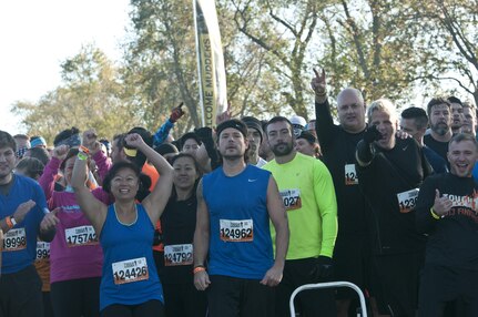 COATESVILLE, Penn. - Tough Mudders cheer before beginning the Tough Mudder Philly event Oct. 17 in Coatesville, Penn. The U.S. Army Reserve was one of the sponsors for the event. (U.S. Army photo by Sgt. Hector Membreno)