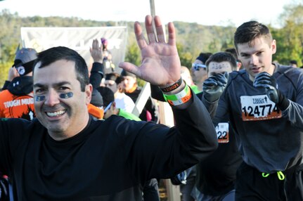 COATESVILLE, Penn. - Tough Mudders begin the Tough Mudder Philly course in Coatesville, Penn., Oct. 17. The U.S. Army Reserve was one of the sponsors for the event.(U.S. Army photo by Staff Sgt. Bradley Miller)