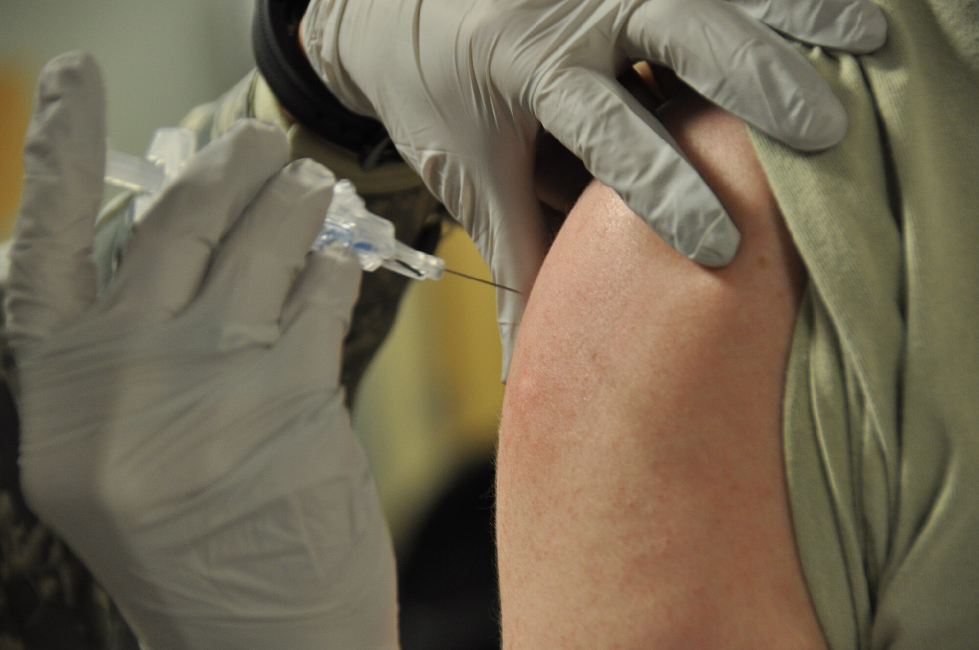 Medical technicians from the 512th Aerospace Medicine Squadron administer flu shots to 512th Airlift Wing reservists Oct. 17, 2015 during the unit training assembly at the base medical clinic at Dover Air Force Base, Del.The wing provided hundreds of immunizations that day in preparation for the upcoming flu season, which most commonly peaks in the United States in January or February.(U.S. Air Force photo/Staff. Sgt. Joe Yanik)