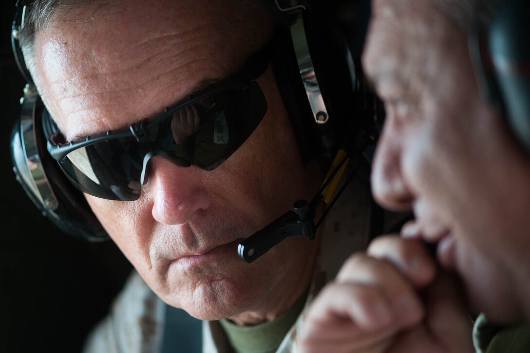U.S. Marine Corps Gen. Joseph F. Dunford Jr., chairman of the Joint Chiefs of Staff, receives a brief on board an Israeli helicopter en route to northern Israel, Oct. 18, 2015. DoD photo by D. Myles Cullen